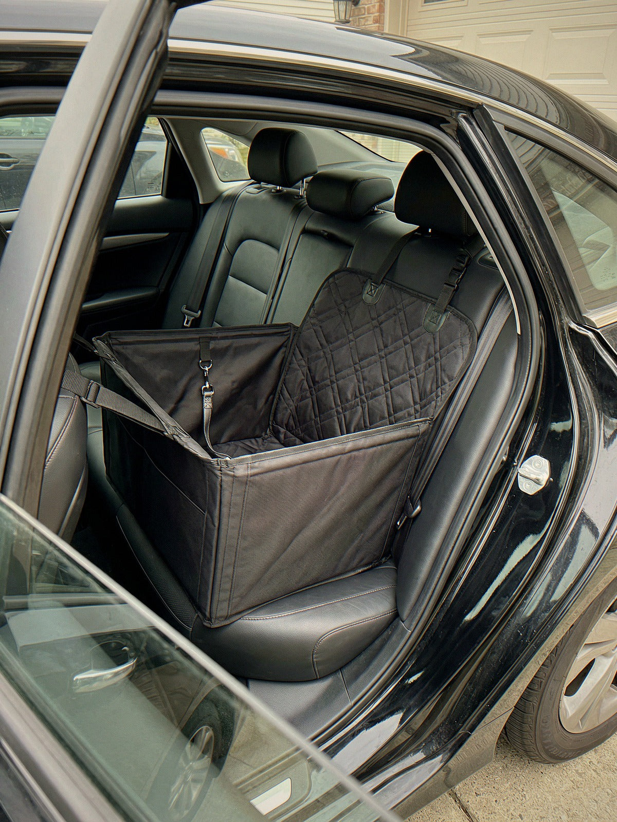 CuddleCruiser dog car seat installed in car with leather seats